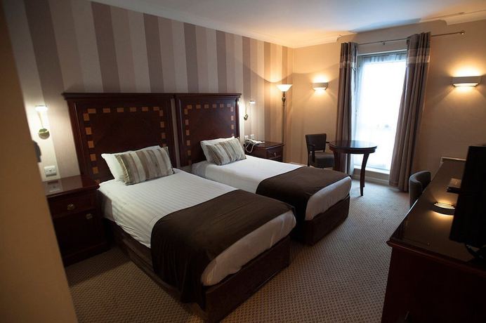 Imagen de la habitación del Hotel Manor of Groves. Foto 18