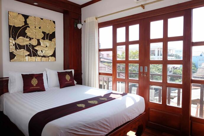 Imagen de la habitación del Hotel Manorom Boutique. Foto 7