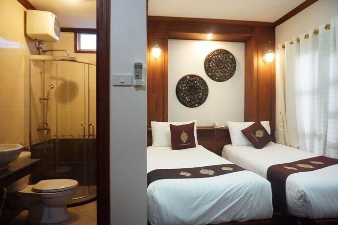 Imagen de la habitación del Hotel Manorom Boutique. Foto 9