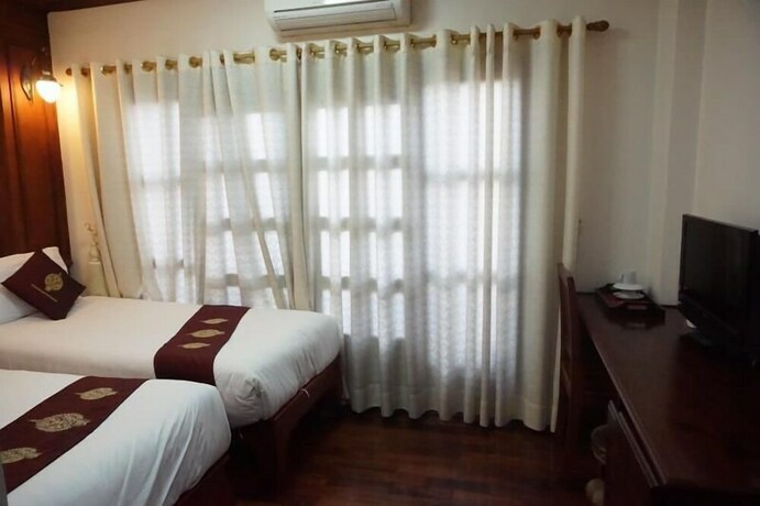 Imagen de la habitación del Hotel Manorom Boutique. Foto 22