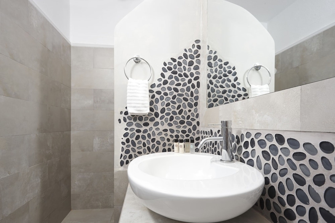 Imagen de la habitación del Hotel Manos Small World. Foto 15