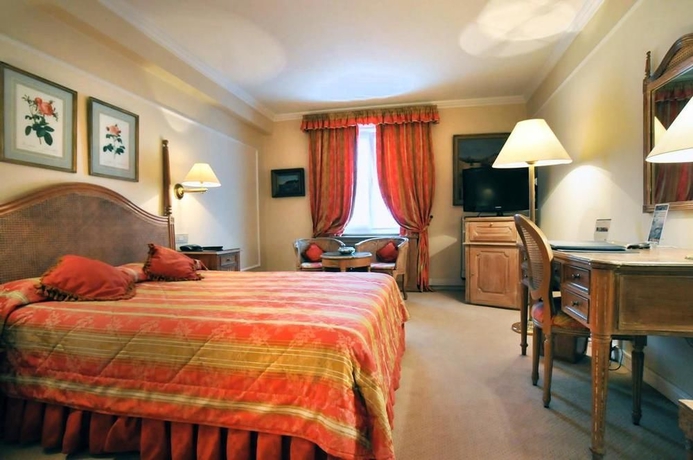 Imagen de la habitación del Hotel Manos Stephanie. Foto 6