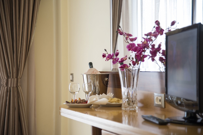 Imagen de la habitación del Hotel Manousos City. Foto 6