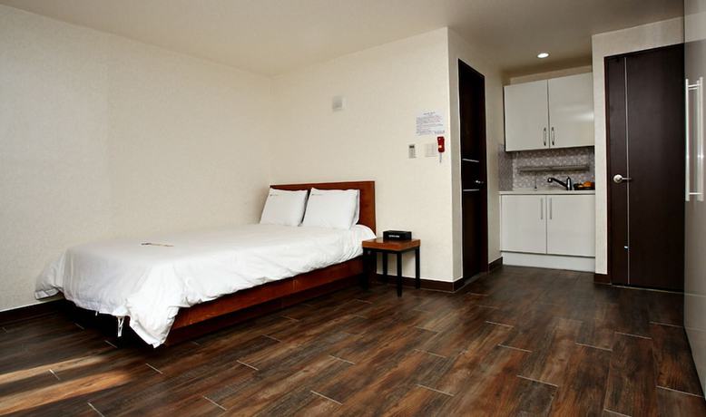 Imagen de la habitación del Hotel Manripo Hotel. Foto 12