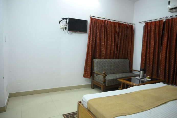 Imagen de la habitación del Hotel Mansarovar and Banquets. Foto 12