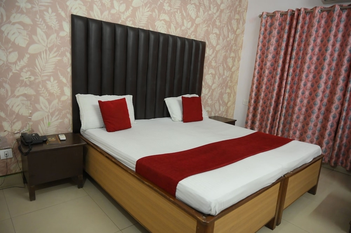 Imagen de la habitación del Hotel Mansarovar and Banquets. Foto 13