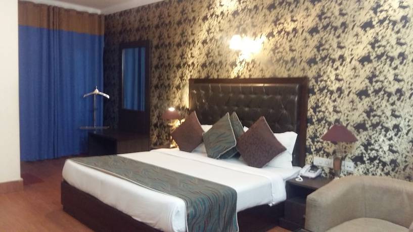 Imagen de la habitación del Hotel Mansarover Paradise. Foto 8