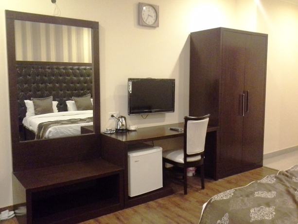 Imagen de la habitación del Hotel Mansarover Paradise. Foto 11