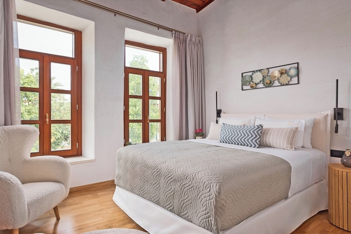 Imagen de la habitación del Hotel Mansio Boutique. Foto 10