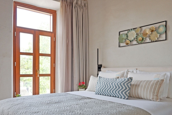 Imagen de la habitación del Hotel Mansio Boutique. Foto 13
