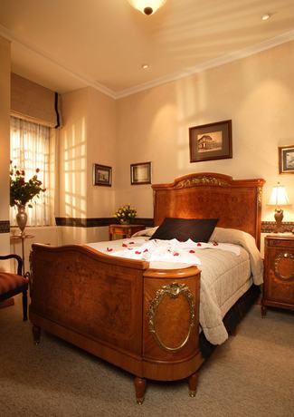 Imagen de la habitación del Hotel Mansión Alcázar Boutique. Foto 8