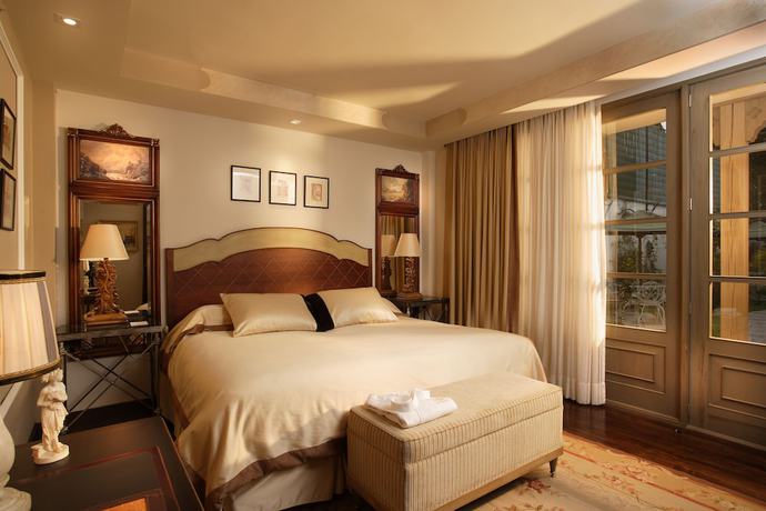 Imagen de la habitación del Hotel Mansión Alcázar Boutique. Foto 13