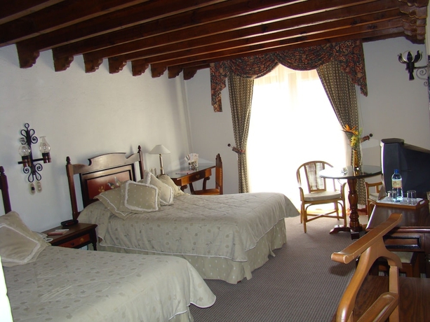 Imagen de la habitación del Hotel Mansi&oacute;n Del Cupatitzio. Foto 7