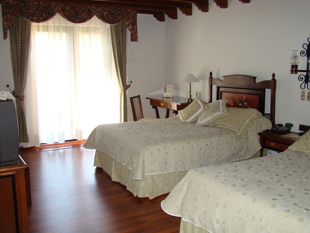 Imagen de la habitación del Hotel Mansi&oacute;n Del Cupatitzio. Foto 9
