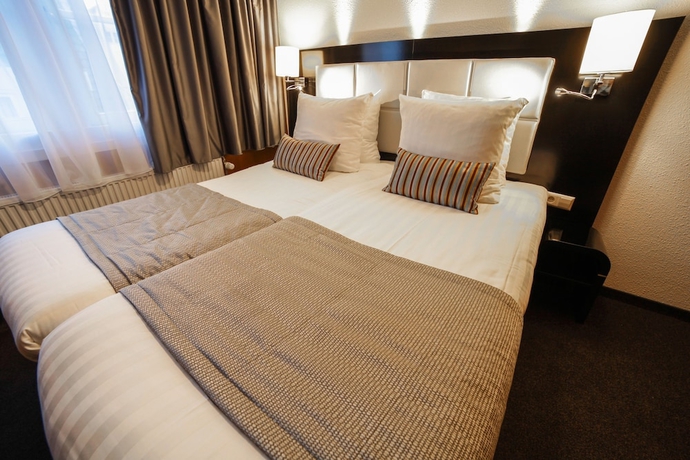 Imagen de la habitación del Hotel Mansion, Ámsterdam. Foto 16