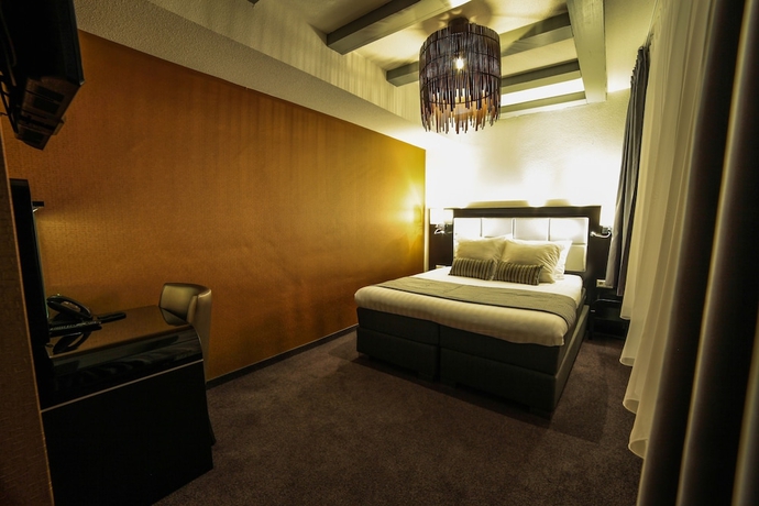Imagen de la habitación del Hotel Mansion, Ámsterdam. Foto 17