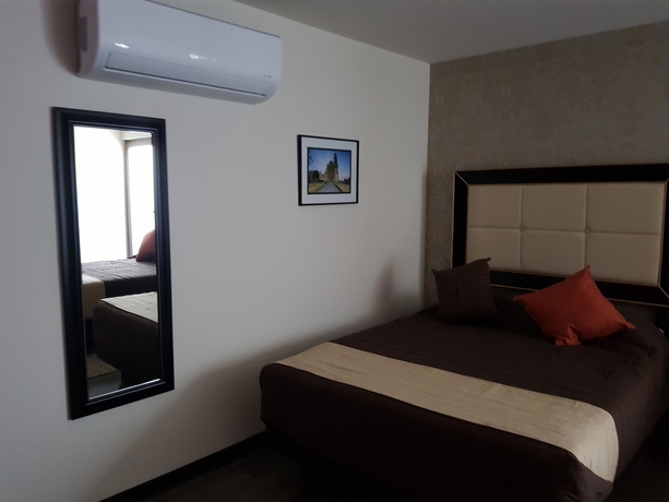 Imagen de la habitación del Hotel Mansion Azul Cholula. Foto 4