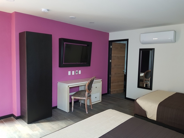 Imagen de la habitación del Hotel Mansion Azul Cholula. Foto 9