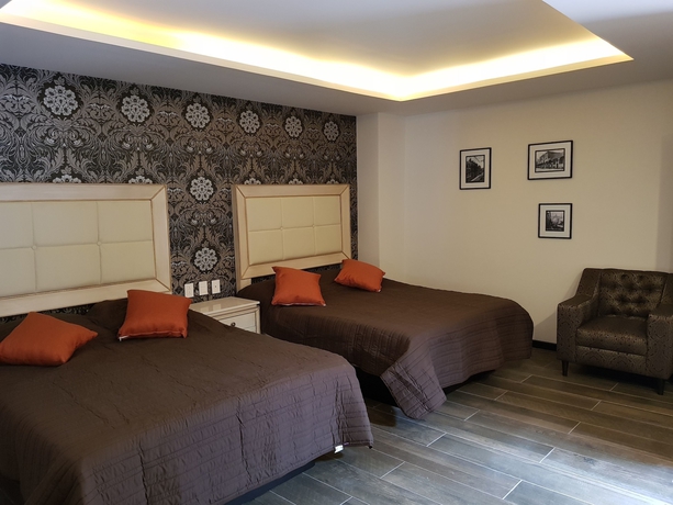 Imagen de la habitación del Hotel Mansion Azul Cholula. Foto 10