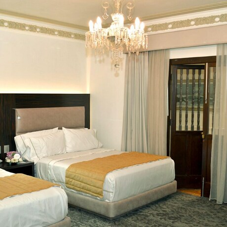 Imagen de la habitación del Hotel Mansion De Los Abuelos Boutique. Foto 30
