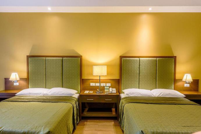 Imagen de la habitación del Hotel Mansion Garden Hotel. Foto 5
