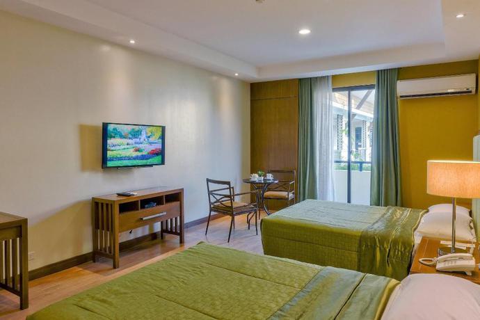 Imagen de la habitación del Hotel Mansion Garden Hotel. Foto 7