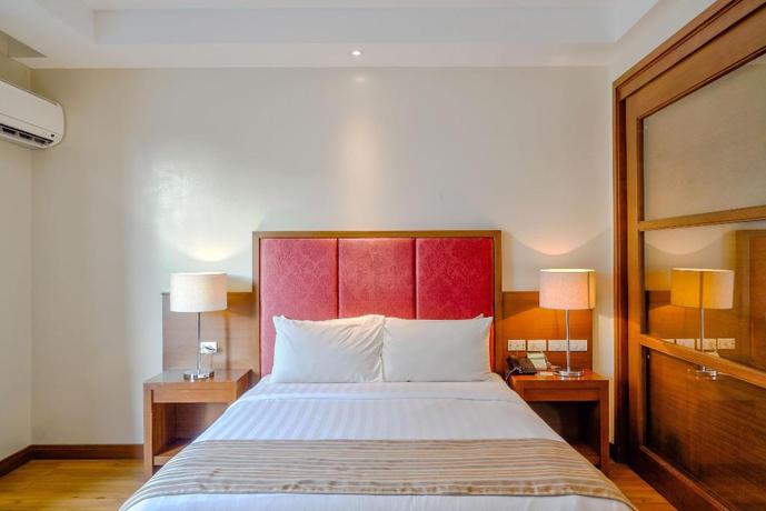 Imagen de la habitación del Hotel Mansion Garden Hotel. Foto 9