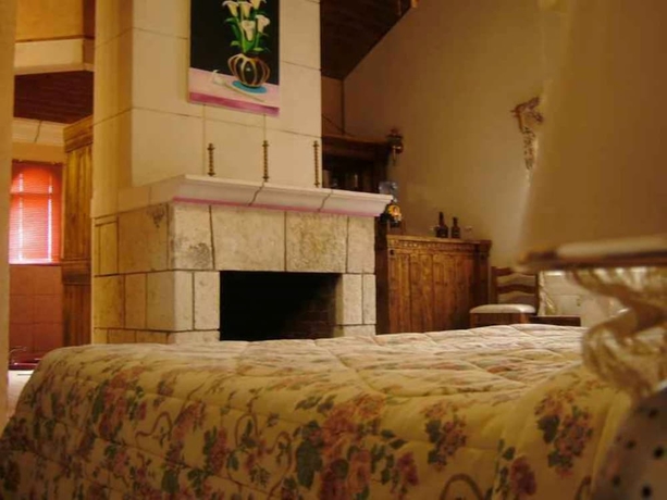 Imagen de la habitación del Hotel Mansion Tarahumara. Foto 13