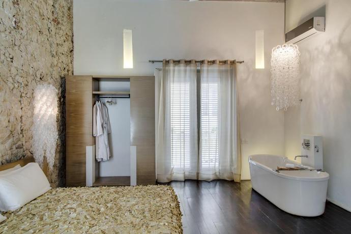 Imagen de la habitación del Hotel Mansion Tcherassi. Foto 13