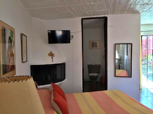 Imagen de la habitación del Hotel Mansion del Bosque. Foto 13