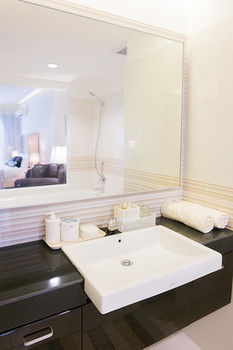 Imagen de la habitación del Hotel Mansion28 At Dharmawangsa. Foto 8