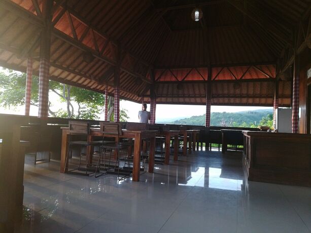 Imagen del bar/restaurante del Hotel Manta Cottage Seaview Plus. Foto 16