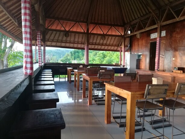 Imagen del bar/restaurante del Hotel Manta Cottage Seaview Plus. Foto 17