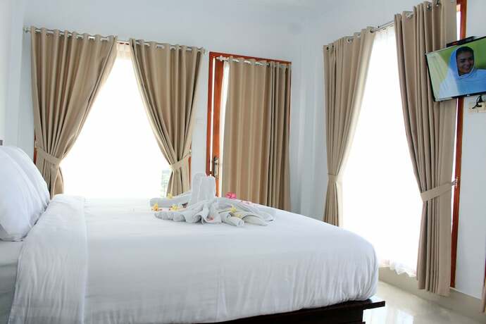 Imagen de la habitación del Hotel Manta Cottage Seaview Plus. Foto 20