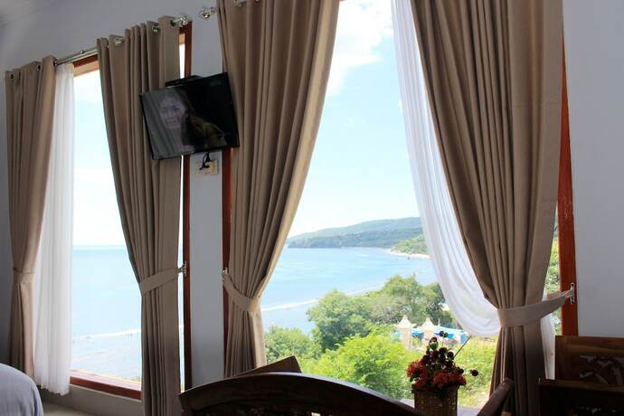 Imagen de la habitación del Hotel Manta Cottage Seaview Plus. Foto 23