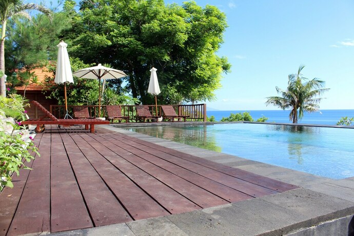 Imagen de la piscina del Hotel Manta Cottage Seaview Plus. Foto 29