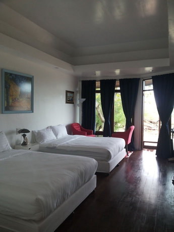 Imagen de la habitación del Hotel Mantakiri Island Resort Private Island. Foto 4