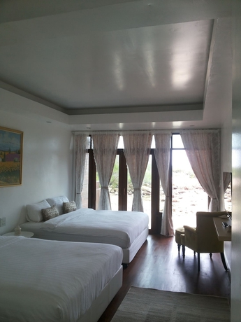 Imagen de la habitación del Hotel Mantakiri Island Resort Private Island. Foto 14