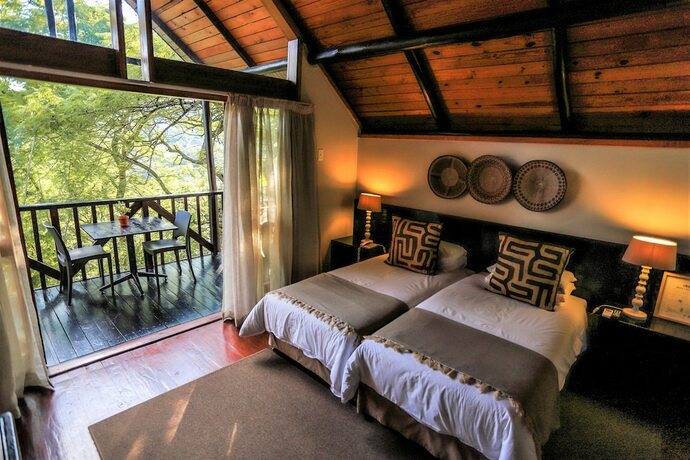 Imagen de la habitación del Hotel Mantenga Lodge. Foto 17