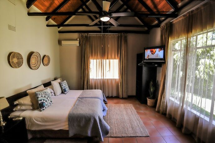 Imagen de la habitación del Hotel Mantenga Lodge. Foto 18
