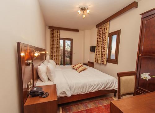 Imagen de la habitación del Hotel Manthos Resort & Spa. Foto 6