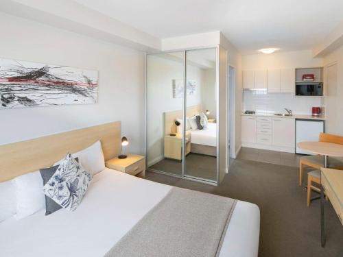 Imagen de la habitación del Hotel Mantra Castle Hill Sydney. Foto 18