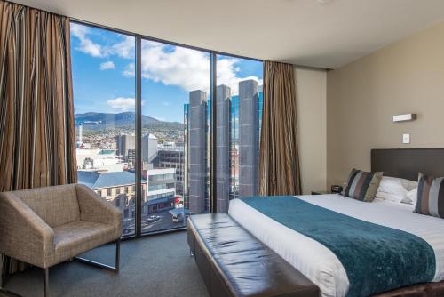 Imagen de la habitación del Hotel Mantra Collins. Foto 15