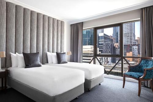 Imagen de la habitación del Hotel Mantra On Russell. Foto 14