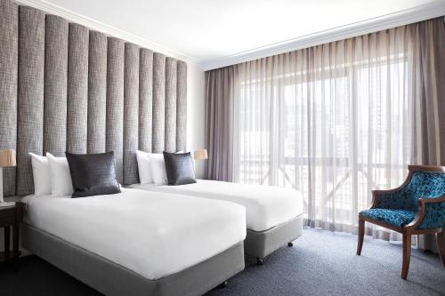 Imagen de la habitación del Hotel Mantra On Russell. Foto 17