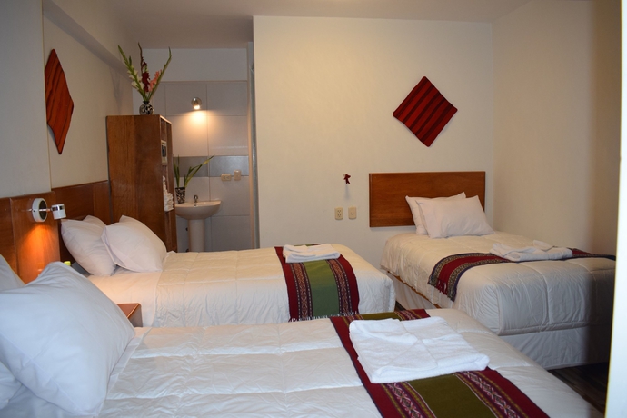 Imagen de la habitación del Hotel Mantu Boutique. Foto 10