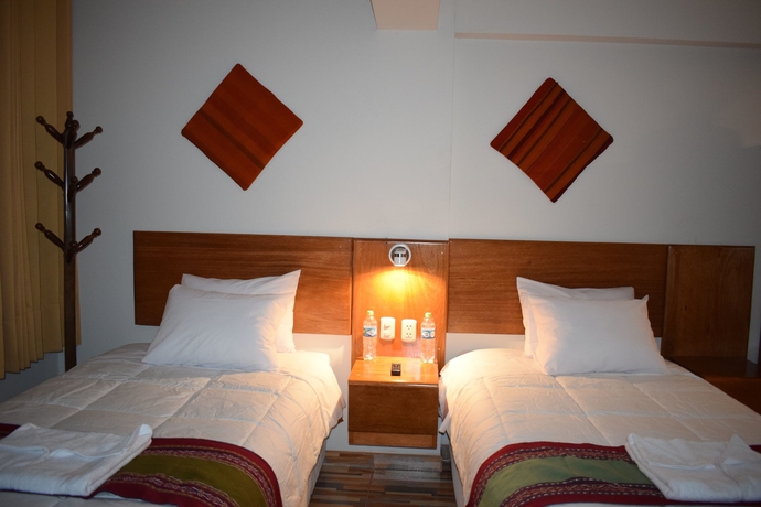 Imagen de la habitación del Hotel Mantu Boutique. Foto 12