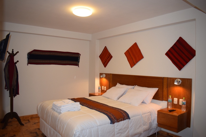 Imagen de la habitación del Hotel Mantu Boutique. Foto 13