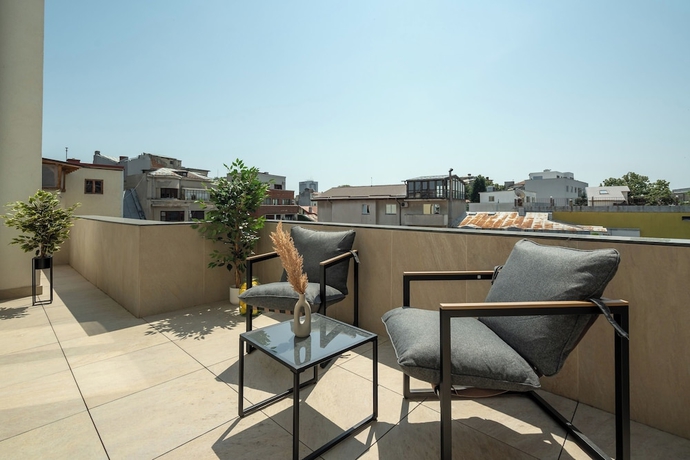 Imagen de la habitación del Hotel Manu Art Living. Foto 11
