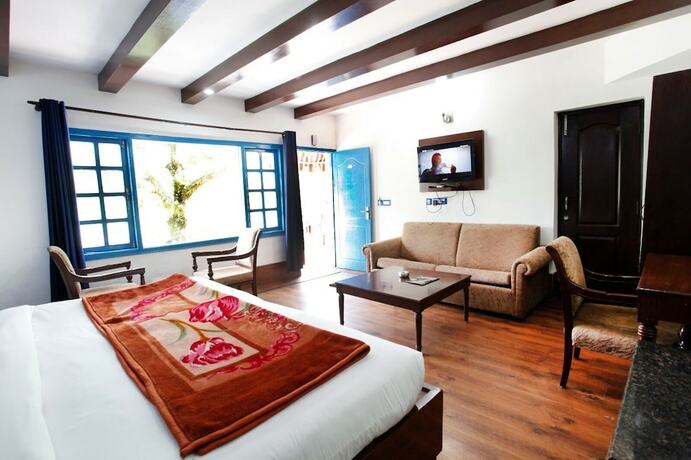 Imagen de la habitación del Hotel Manu Maharani Regency. Foto 16